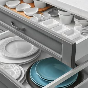 Set of tableware in kitchen drawers | Pierce Flooring