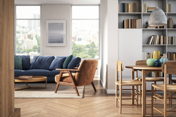 Blue sofa with chairs in living room | Pierce Flooring